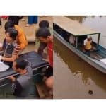 Seorang pasien dinaikkan perahu untuk dirujuk ke Kota Kendari